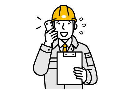 電話で現場の状況説明をする社員